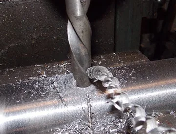 Drilling metal